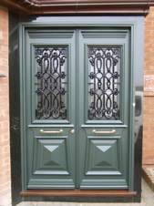 Traditional front door in the Greek Revival style Traditional front door in the Greek Revival style