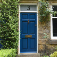 What types of wooden doors are best for Cheshire's climate